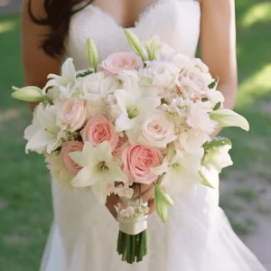light pink, pink and white bridal bouquet made with roes and lilies